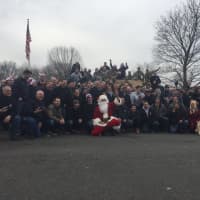 <p>Closter Police Officer Justin Krapels as Santa with the volunteers at this year&#x27;s Bergen County PBA Toy Drive.</p>