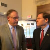 <p>EPA New England Regional Administrator Curtis Spalding talks with U.S. Sen. Richard Blumenthal in Stratford Thursday.</p>