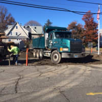 <p>Workers break up pavement to make room for a new pocket park in Bridgeport&#x27;s Black Rock neighborhood.</p>