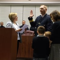 <p>Little Falls Mayor Darlene Conti swears in new Police Chief Steve Post Monday, Dec. 7.</p>