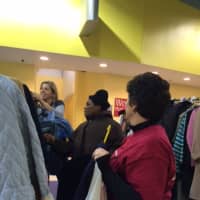 <p>Guests browse for winter coats at the Bridgeport Rescue Mission&#x27;s Great ThanksGiving Project.</p>