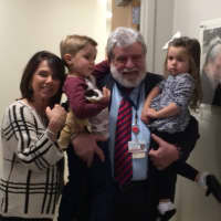 <p>Dr. Frank Scifo poses with his daughterJennifer Baglio and his grandchildren Nicholas, 4, and Samantha Baglio, 3.</p>