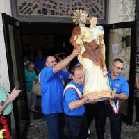 <p>Carrying the St. Joseph statue</p>