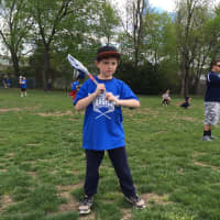 <p>A young lacrosse player readies for a catch.</p>