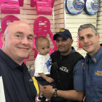 <p>SELFIE! Paramus Sergeant James Teehan, Officer Amit Vaidya and Sergeant Brian Linden with baby Lucas.</p>