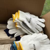 <p>Boxes of gloves and hats are on hand for volunteers at the UBS Parade Spectacular Thursday.</p>