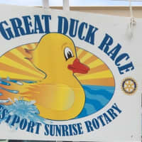 <p>The Great Duck Race’s great sign. The event is sponsored by the Westport Sunrise Rotary.</p>