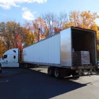 <p>Secret Santa filled this entire truck with food donations.</p>