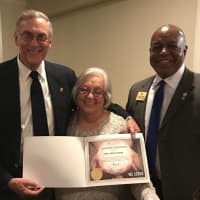 <p>Phil Oldham of Larchmont, left, received the Lions Club President&#x27;s Certificate of Appreciation from District Governor Norma Mendez Cruz and Past International Director Douglas Alexander.</p>