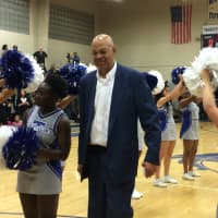 <p>Longtime Teaneck basketball coach Curtis March walks through a wave of supporters at a court-naming ceremony in his honor Thursday, Jan. 7.</p>