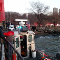 <p>Units await the Lt. Michael T. Murphy on the Manhattan shore.</p>