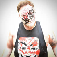 <p>Wrestling has allowed Marconi to adopt trends and incorporate them into his act to express his thoughts. Such as this Occupy Wall Street-inspired &quot;change&quot; look that he used when he felt slighted by a wrestling organization.</p>