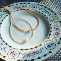 <p>Mari Keating Schofield handcrafts the Pearls for Peace necklaces.</p>