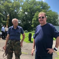 <p>Museum officials Leslie Altschuler (right) and Jack Brown noticed some of the guns on deck were out of place and hatches were open when they arrived Tuesday at the museum.</p>