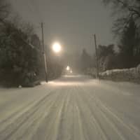 <p>Snow falling in Pondfield Road in Bronxville.</p>