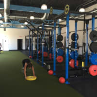 <p>Working out at Next Generation Fitness in Norwalk.</p>