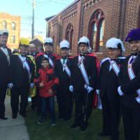 <p>Members of the Knights of Columbus’s St. Matthew Norwalk Council 14360 pose with a young parishioner of The Shrine Church of Our Lady of Solace on Saturday, Dec. 20.</p>