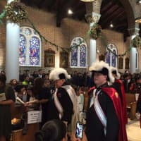 <p>The St. Matthew Knights Honor Guard at the re-dedication of Our Lady of Solace Church in Coney Island in December 2015.</p>