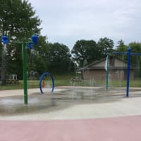 <p>Water shoots from high and low at the new spray park at Kenosia Park in Danbury.</p>