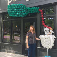 <p>Andrea Gartner at her new PourMe Cafe on Main Street in Danbury.</p>