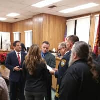 <p>East Rutherford Mayor James Cassella swears in William Zito while Police Commissioner Brizzi and Zito&#x27;s family look on.</p>