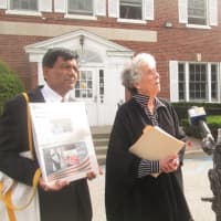 <p>Vishnu Patel and Susan Siegel respond to allegations they acted improperly in front of Yorktown Town Hall Thursday.</p>