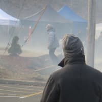 <p>A Justin Theroux lookalike on the set of &quot;The Girl on the Train&quot; in Irvington on Thursday. He said he didn&#x27;t know who Theroux is. Fake fog was blown onto the set in the background.</p>