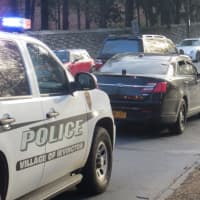 <p>Irvington police at the intersection of Route 9 and Station Road on Thursday afternoon. The road was closed all week for filming of &quot;The Girl on the Train.&quot;</p>