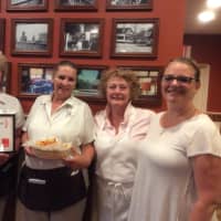 <p>The crew at JK&#x27;s - Original Texas Hot Weiners in Danbury accepts the certificate for Best French Fries In Fairfield County.</p>