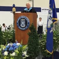 <p>Superintendent of Schools Elliott Landon speaks at his last Staples High graduation. He retires this summer.</p>