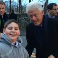 <p>Former President Bill Clinton gets out of his car to take a selfie with 15-year-old Kevin Pelletier before appearing at a fundraiser in Black Rock.</p>