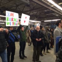 <p>Bernie Sanders fans show their support at a rally at Rampage Skate Shop.</p>