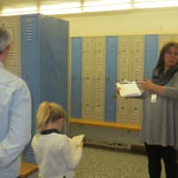 <p>A proposed $9.3 million bond issue would include renovating the Mamaroneck High School locker rooms. Athletic Director Bari Suman led tours of the high school last week.</p>