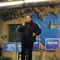 <p>Former State Rep. Hector Diaz speaks to the crowd at a Bridgeport rally for presidential hopeful Bernie Sanders.</p>