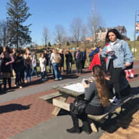 <p>Lindita Kulla (right) of Watertown, CT, said she visited Newtown Elementary School after Presidents Weekend, promising &quot;Never again,&quot; to gun violence. Kulla, a Pace University sophomore, helped organize a vigil to remember Parkland, Fla. gun victims.</p>