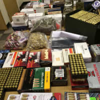 <p>Ammunition and other things seized from an Aldine Avenue home Saturday</p>
