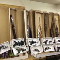 <p>Weapons seized Saturday night from an Aldine Avenue home.</p>