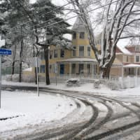 <p>Roads were wet but passable at the corner of Ellsworth and Hackley streets in Bridgeport Friday.</p>