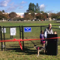 <p>Jacob Saadi, 8, thanks Danbuy&#x27;s mayor for building the dog park, and introduces his sister, Sabrina to the crowd assembled for the dog park&#x27;s ribbon cutting on Monday. Danbury Mayor Mark Boughton looks on with his dog, Ellie.</p>
