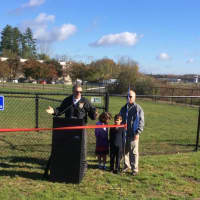 <p>Director of Public Works Antonio Iadarola says a few words before the ribbon-cutting at Danbury&#x27;s new dog park. The Saadi twins, Sabrina and Jacob, 8, look on with Mayor Mark Boughton.</p>
