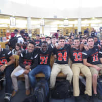 <p>The White Plains High School football team were on hand to see their most famous alum. </p>