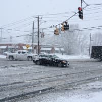<p>Traffic moving at the corner of the Post Road and North Benson Road in Fairfield.</p>