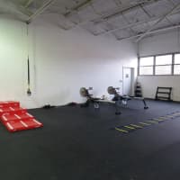 <p>A-Game Sports features and strength and conditioning area set aside next to the multi-sport field in New Rochelle.</p>