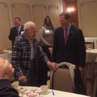 <p>John Boboc, 94, and U.S. Sen. Blumenthal share a laugh as Blumenthal recognizes Boboc for his World War II military service prior to the AAA Northeast Senior Policy Summit at Norwalk Inn &amp; Conference Center.</p>