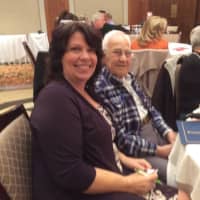 <p>Denna Chenette, AAA traffic safety instructor, sits next to John Boboc, 94, one of her students, who was recognized for his World War II military service by U.S. Sen. Richard Blumenthal prior to the AAA Northeast Senior Policy Summit at Norwalk Inn.</p>
