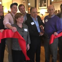 <p>A ribbon-cutting ceremony on Thursday evening at The Rex, a new lobster and pizza restaurant at 247 North Central Ave. (Route 100) in Hartsdale. Front row, from left, are Bridget Gibbons, Rex owner Jonathan Otto and Greenburgh Supervisor Paul Feiner.</p>