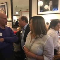 <p>Greenburgh Supervisor Paul Feiner, left, talks with Maria Gomez at the grand opening of The Rex on Thursday evening. Gomez&#x27; daughter, Michelle, is a manager at the new lobster and pizza restaurant at 247 North Central Ave. (Route 100) in Hartsdale.</p>