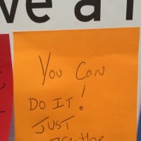 <p>Patrons at Darien Library wrote words of encouragement on sticky notes for Darien High School students studying for midterms. The notes are located on a glass window on the library&#x27;s first floor.</p>