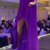 <p>Ashley Barrios rocks purple at the Elmwood Park fashion show Thursday.</p>