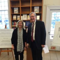<p>Stamford David Martin poses with Ferguson Library President Alice Knapp before they announced the opening of a new walkway at the library Tuesday.</p>
